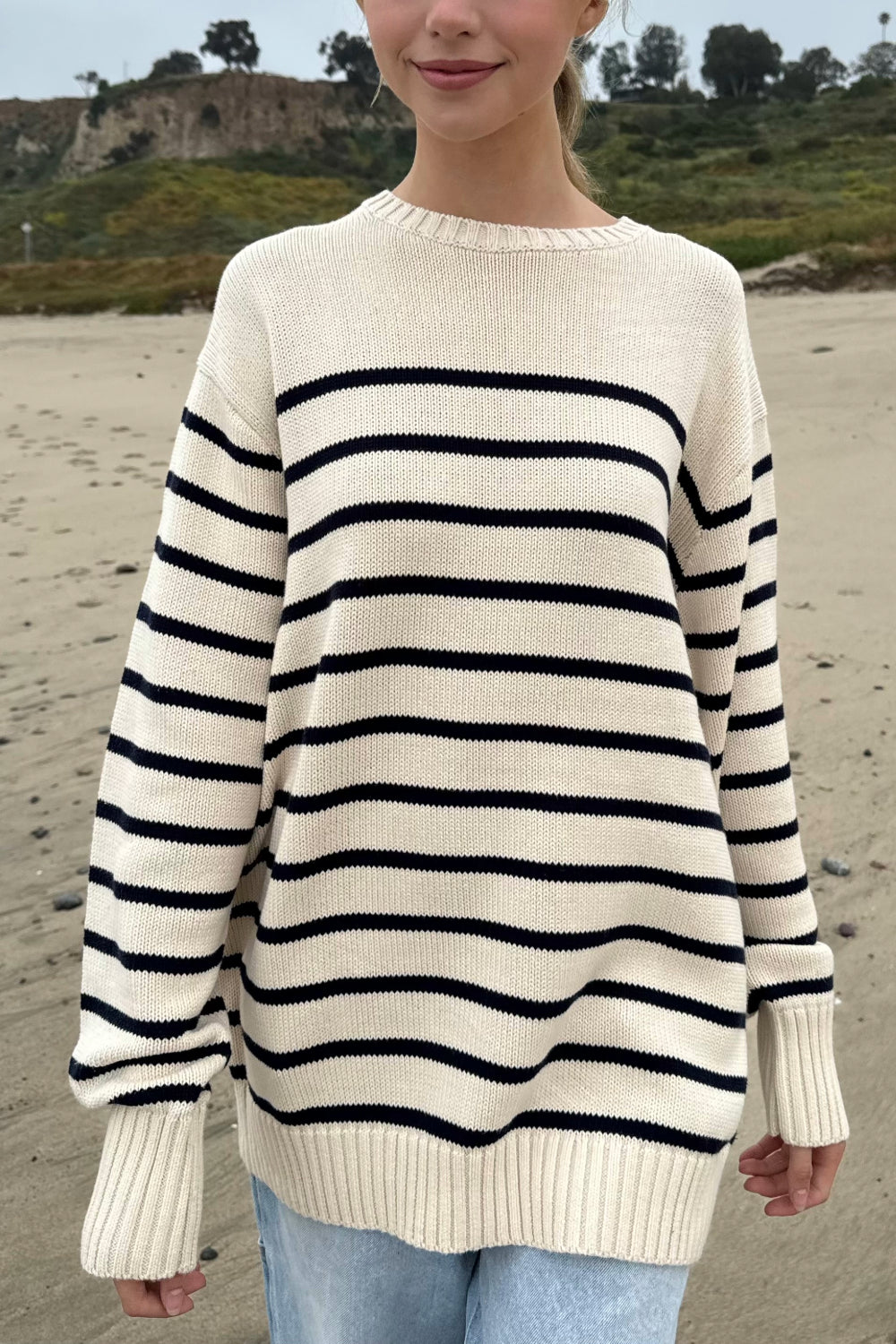 Black and white striped pullover hotsell